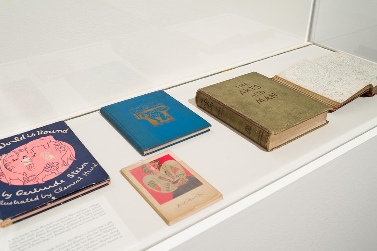 Printed books in a display case